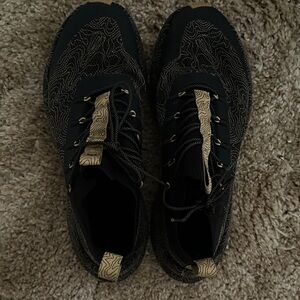 Stylish Black and Gold Athletic Shoes